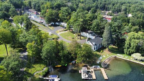 an aerial view of a house on the water at The Villas on Lake George in Diamond Point