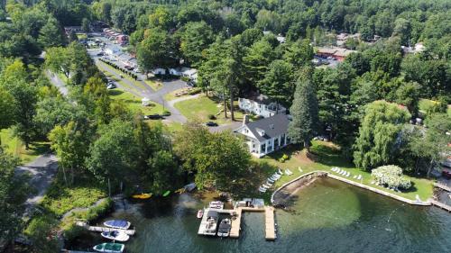an aerial view of a house on the water at The Villas on Lake George in Diamond Point