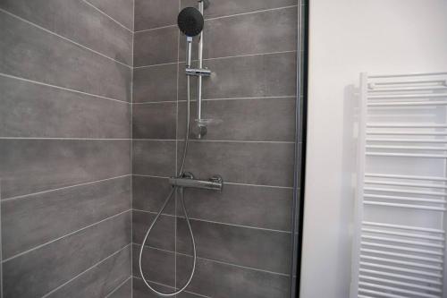 Ванна кімната в Charmant T2 dans residence neuve
