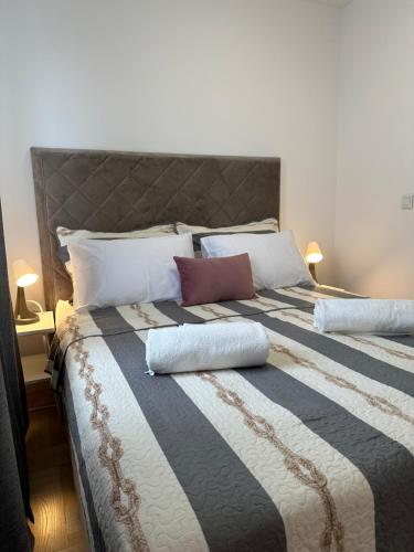 Ένα ή περισσότερα κρεβάτια σε δωμάτιο στο Mila’s place