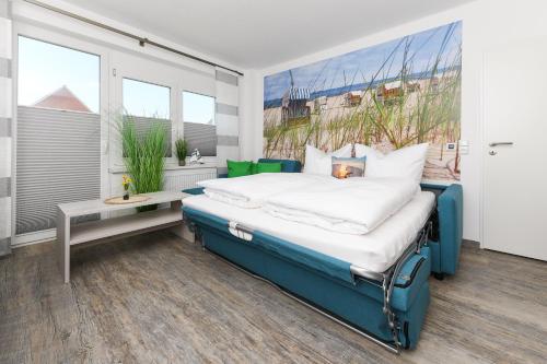 Postel nebo postele na pokoji v ubytování Haus Strandkorb mit Frühstücksoption