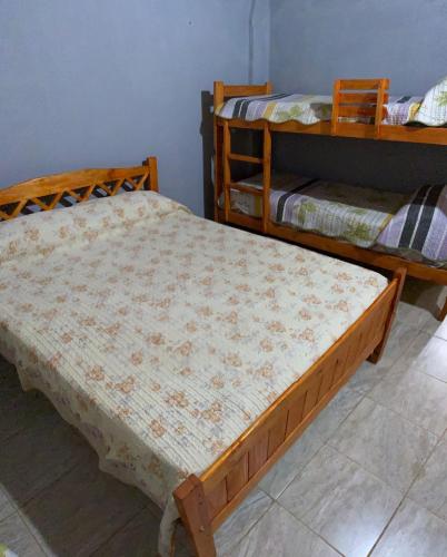 a bedroom with two bunk beds in a room at Luz maria in Empedrado