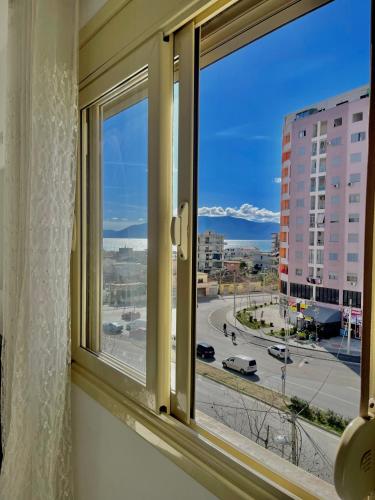 ein Fenster mit Stadtblick in der Unterkunft Apartment Number 1 Gym included in Vlorë