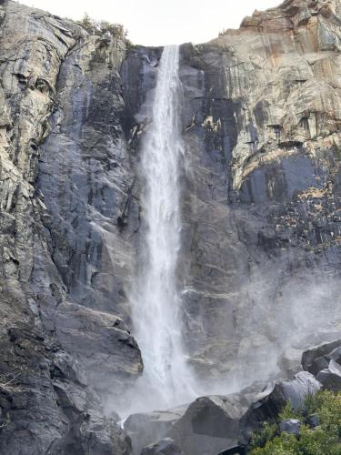 a waterfall on the side of a rocky cliff at Yosemite Condominium Loft unit -B202 in Yosemite West