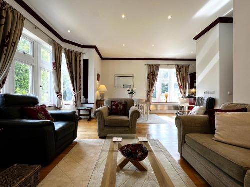 Ein Sitzbereich in der Unterkunft 6 Shanklin Manor - family friendly apartment in Shanklin Old Village