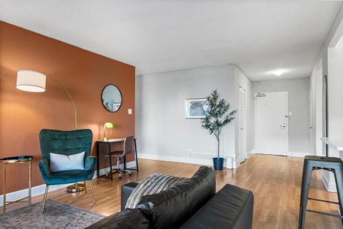 a living room with a couch and a table at DC Luxury Apartment Near Metro in Arlington