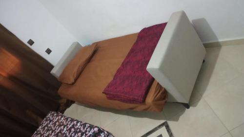 a box with two towels in it on the floor at Apartment 20m from Martil beach in Tétouan