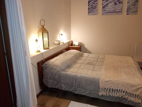 Postel nebo postele na pokoji v ubytování La Finestra sull'Etna