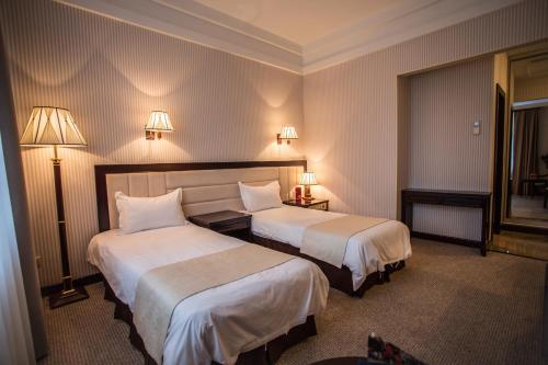 Sofievsky Posad Hotelにあるベッド