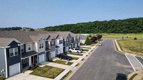 an aerial view of a residential street with houses at Luray Caverns New Townhome with 3 bedrooms with 1500sqft in Luray