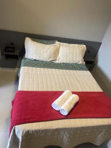 Katil atau katil-katil dalam bilik di Hospedagem Confortável e Prática para viajantes e férias - Próxima à BR-101