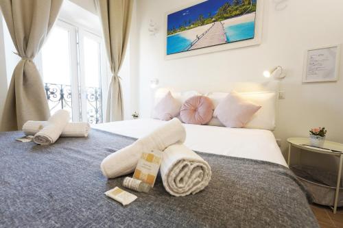 En eller flere senge i et værelse på Cicero Rome Center