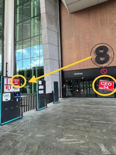a yellow measuring line in front of a building at Lotus Airport Hotel in İmrahor