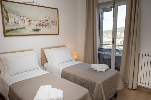 Postel nebo postele na pokoji v ubytování Casa Don Giovanni - Amazing View