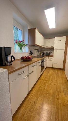 Kuchyň nebo kuchyňský kout v ubytování Ferienhaus am weißen Adler
