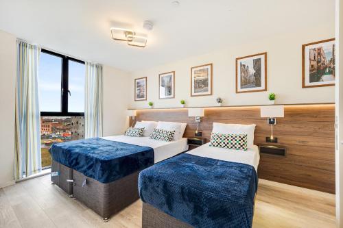 Ένα ή περισσότερα κρεβάτια σε δωμάτιο στο The Curran Suite - 8 Westminster Park