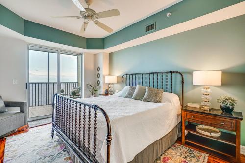a bedroom with a bed and a balcony at Riverfront Fort Myers Condo with Community Amenities in Fort Myers