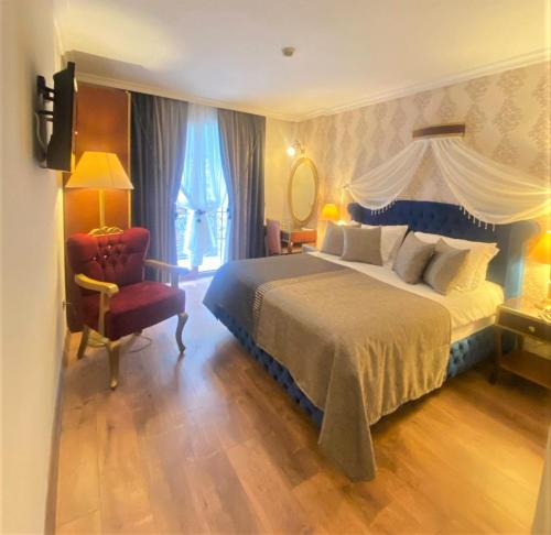 Katil atau katil-katil dalam bilik di Saint John Hotel