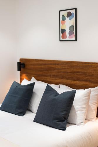 Postel nebo postele na pokoji v ubytování The Haus - Alegria