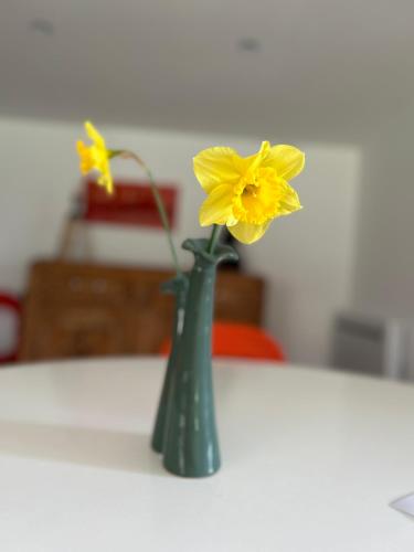 Postel nebo postele na pokoji v ubytování La maison du jardin