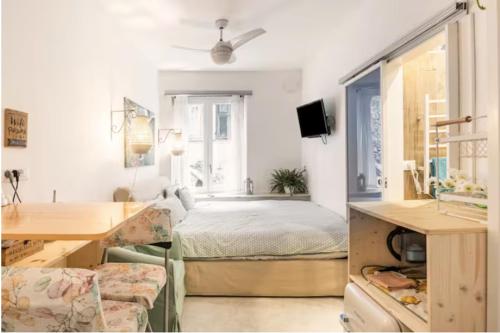 a bedroom with a bed in a room with a window at B&B Casa Limone in Limone sul Garda