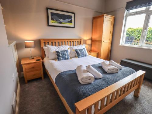 Postel nebo postele na pokoji v ubytování Curlew Cottage at Hawkshead