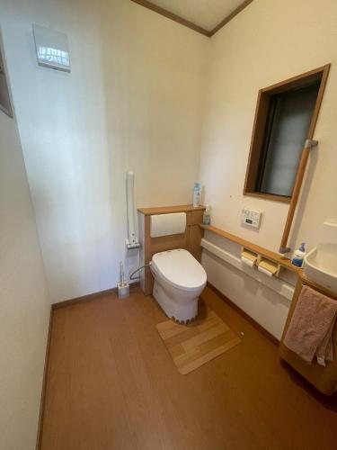 a bathroom with a toilet and a sink at art village - Vacation STAY 16315v in Awa