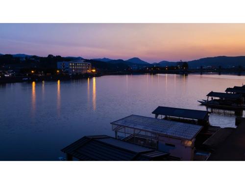 a view of a body of water at sunset at Mikuma Hotel - Vacation STAY 63441v in Hita