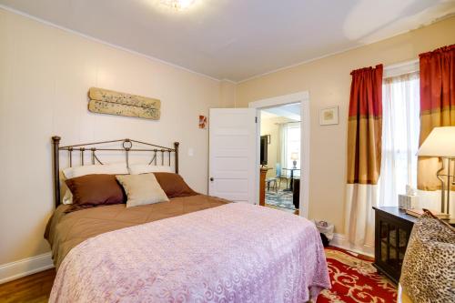 a bedroom with a large bed and a window at Fire Pit, BBQ and Yard Family Home in Adrian in Adrian