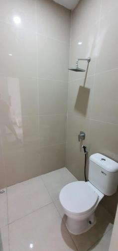 Ett badrum på Bromo Villass