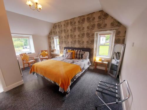 Postel nebo postele na pokoji v ubytování Lawriestone Guest House