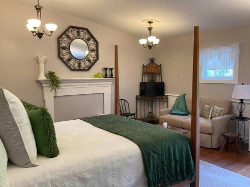 a bedroom with a bed and a living room at Serene Suite by Taconic Ridge, Catamount, Tanglewood, Berkshires in Hillsdale