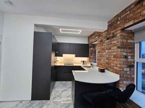 Η κουζίνα ή μικρή κουζίνα στο Spectrum Apartments