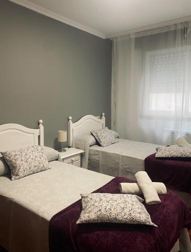 Ένα ή περισσότερα κρεβάτια σε δωμάτιο στο O fogar do camiñante