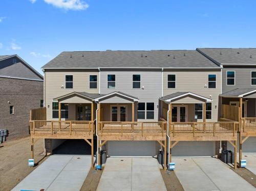 a house under construction with a large deck at Luxury 2 bedrooms, 2.5 baths in Lawrenceville
