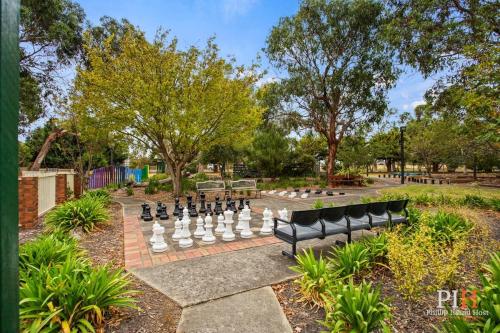a park with a giant chess board and chess pieces at Phillip Island Family Resort 3 BDR in Cowes