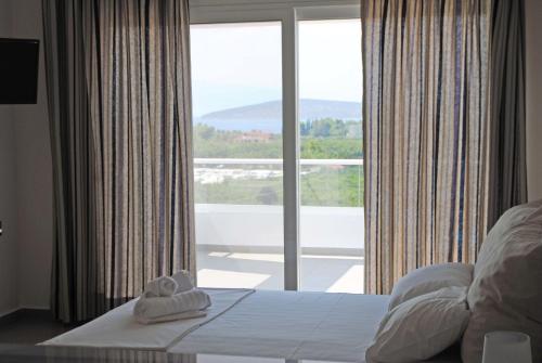 Posteľ alebo postele v izbe v ubytovaní Fevronia's Rooms