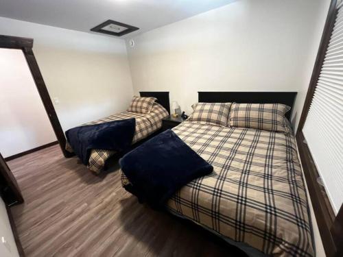 Katil atau katil-katil dalam bilik di The Highmark Cabin