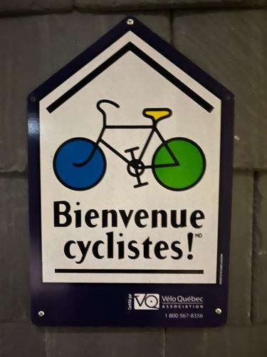 a sign on a wall that reads alternative cycles at Waterfront Chalet Serendipity Hideaway - Cachette Sérendipité - Swim SUPs BBQ Relax w Wifi in Chertsey
