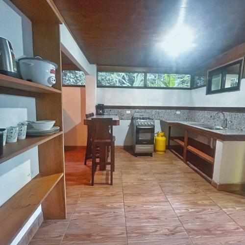 a kitchen with a sink and a counter top at Apartamento Selva y Mar 900 m de playa Manzanillo in Manzanillo