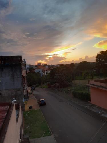 vista su una strada con tramonto sullo sfondo di Departamento completo en edificio Camilo Recalde 477 a Ciudad del Este