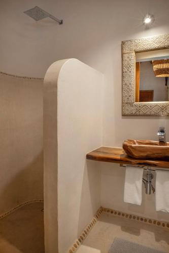 Koupelna v ubytování Mawimbi Boutique Hotel
