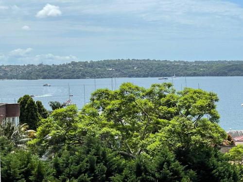 a view of a large body of water with boats at Elizabeth Bay Marina Apartment in Sydney