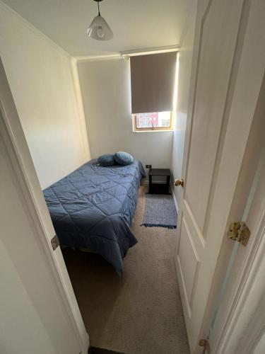 Llit o llits en una habitació de Departamento43