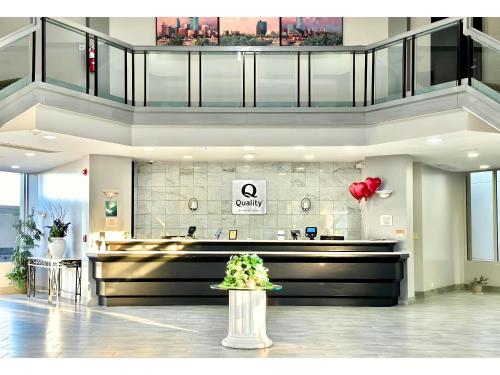 a lobby with a cash counter in a building at Quality Inn Fort Worth - Downtown East in Fort Worth