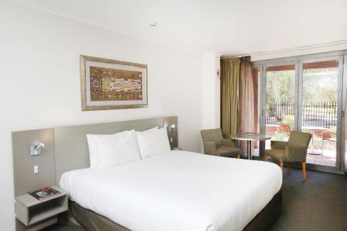 Postelja oz. postelje v sobi nastanitve Stay at Alice Springs Hotel