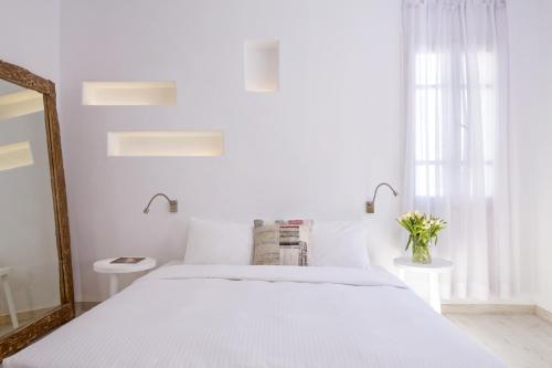 Voodi või voodid majutusasutuse Hippie Chic Hotel toas