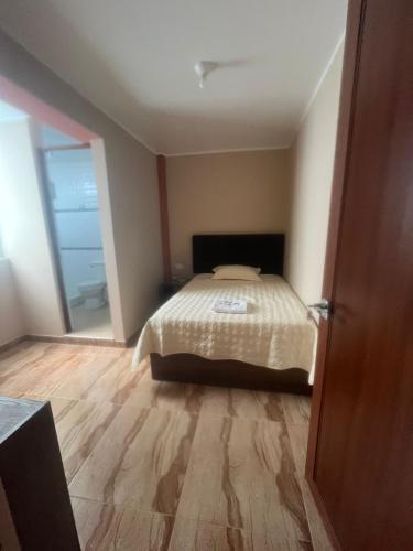 Un ou plusieurs lits dans un hébergement de l'établissement CARDOS HOSTAL