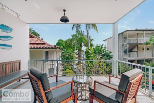 a balcony with a table and chairs and a view at Combo Beach Hotel Samui in Chaweng