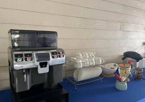 a model of a kitchen with a pretend stove at Srichada Hotel Khaolak - SHA Extra Plus in Khao Lak